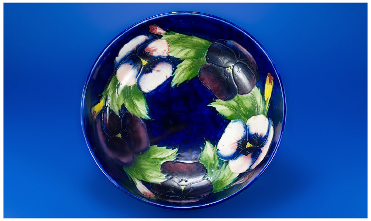 Appraisal: Moorcroft Bowl 'Pansy Pattern' on a Royal Blue ground marks