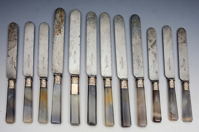 Appraisal: A SET OF SIX TH CENTURY STEEL BLADED TABLE KNIVES