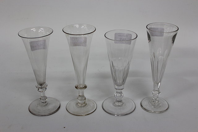 Appraisal: A GROUP OF FOUR VARIOUS CHAMPAGNE FLUTES the largest cm