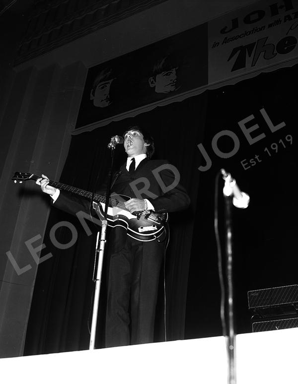 Appraisal: PAUL MCCARTNEY PERFORMING ON STAGE x cm Whilst the Seller