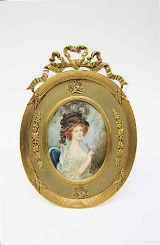 Appraisal: MINIATURE OVAL OIL ON IVORY portrait of a red-haired woman