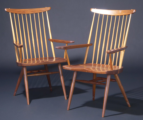 Appraisal: GEORGE NAKASHIMA Pair of walnut New chairs with arms Provenance