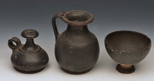 Appraisal: THREE PIECES OF 'HELLENISTIC' BLACK GLAZED POTTERY including a side