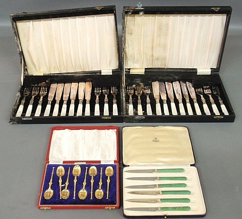 Appraisal: - Two cased Sheffield silver and mother-of-pearl knife and forks