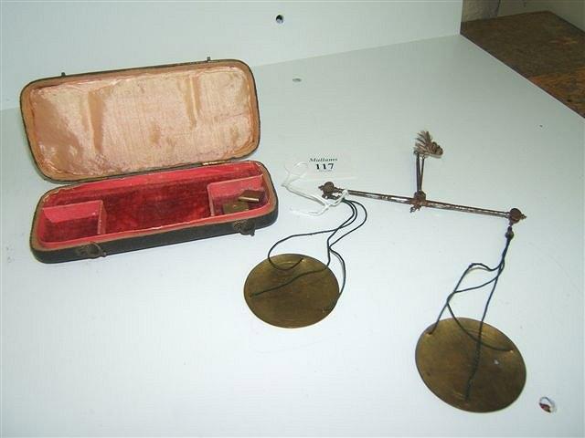 Appraisal: A SET OF GEORGIAN STEEL AND BRASS COIN SCALES within