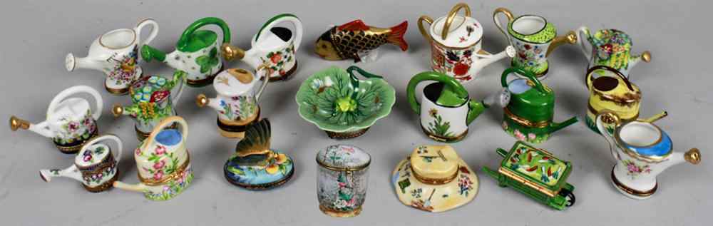 Appraisal: NINETEEN LIMOGES DECORATIVE BOXES Including fourteen watering cans one wheelbarrow