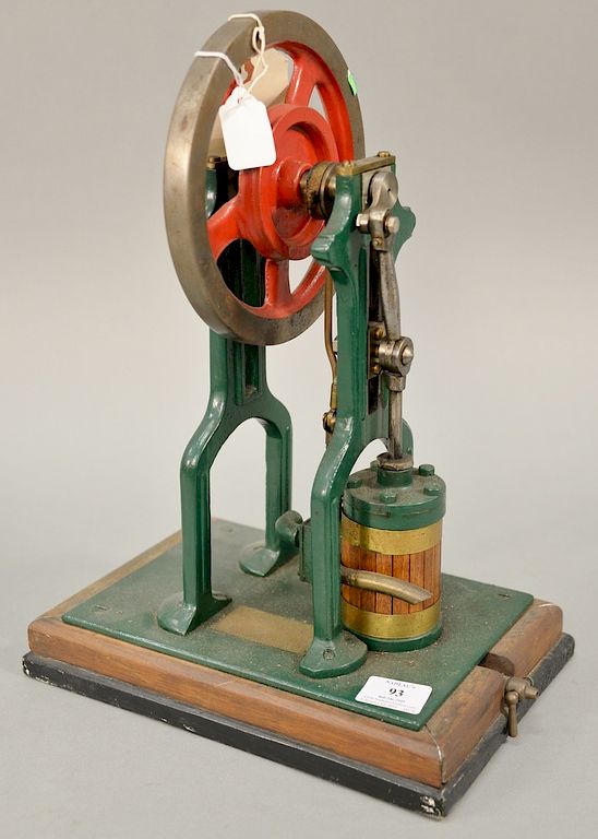 Appraisal: Vertical steam engine with wood lagged cylinder flywheel ht in