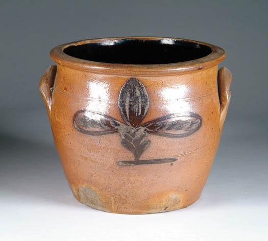 Appraisal: OVOID OPEN STONEWARE CROCK WITH LEAF DESIGN Brownish color with