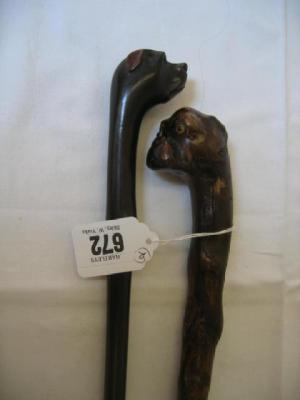 Appraisal: A THORN WALKING STICK the grip modelled as a bull