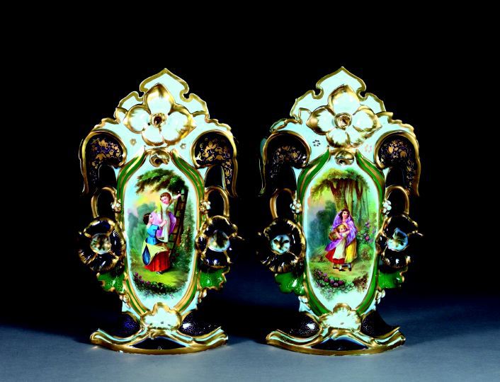 Appraisal: Large Pair of Franco-Bohemian Porcelain Leaf-and-Flowerhead-Handled Garniture Vases third quarter