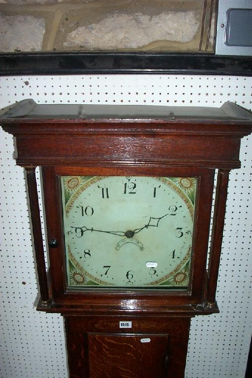 Appraisal: A simple Georgian oak longcase clock with turned column supports