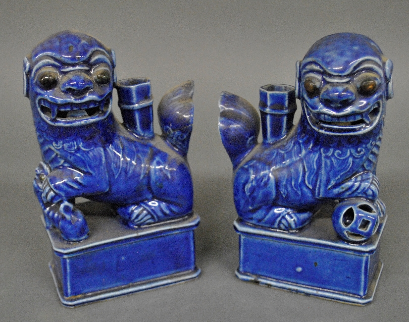 Appraisal: - Pair of blue glazed Foo dog candlesticks probably th