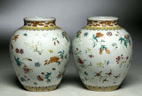 Appraisal: PAIR GUANGXU FAMILLE ROSE JARS Pair delicately Famille Rose enameled