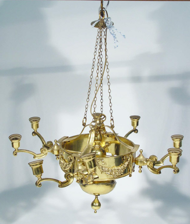 Appraisal: Brass eight branch candelabra with swag mouldings and globular drop