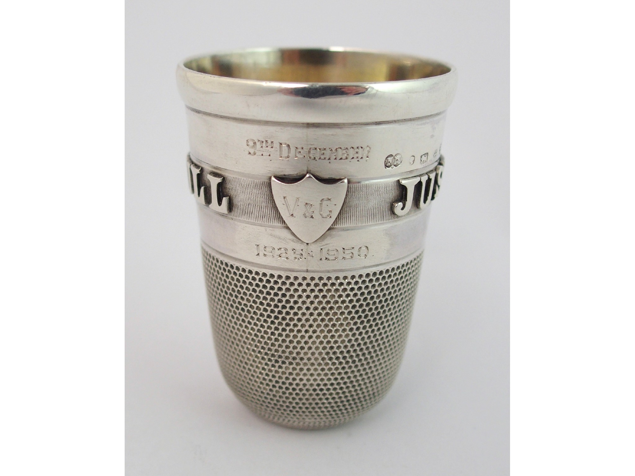 Appraisal: A silver whisky totmaker's marks JN Birmingham modelled as a