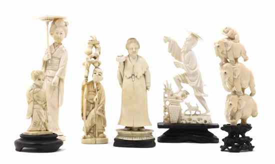 Appraisal: A Collection of Japanese Ivory Figures comprising three ladies two