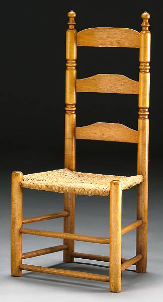 Appraisal: A pair of maple ladder back side chairs New England