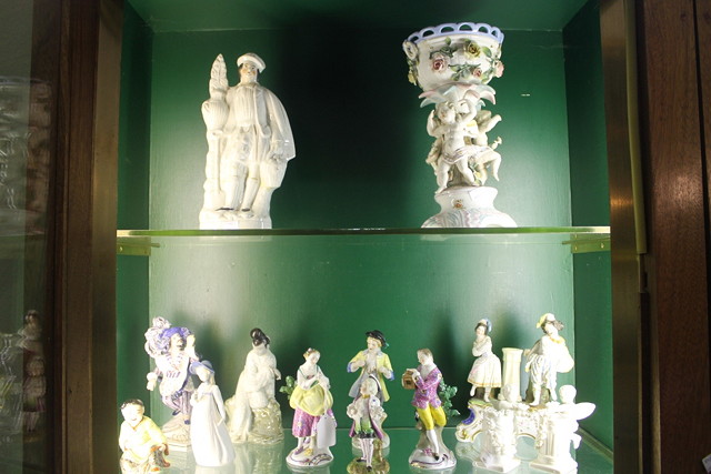 Appraisal: A COLLECTION OF PORCELAIN AND POTTERY FIGURES to include a