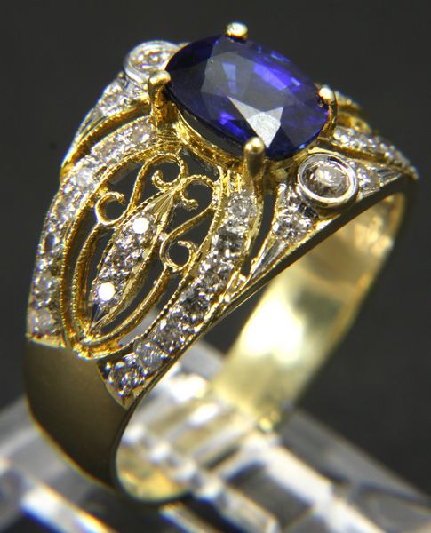 Appraisal: k yellow gold diamond and sapphire ring size ozt total