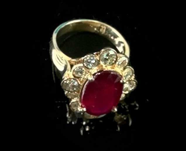 Appraisal: Fourteen-Karat Yellow Gold Ruby and Diamond Dinner Ring featuring one