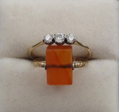 Appraisal: A diamond three stone ring set in gold Size S