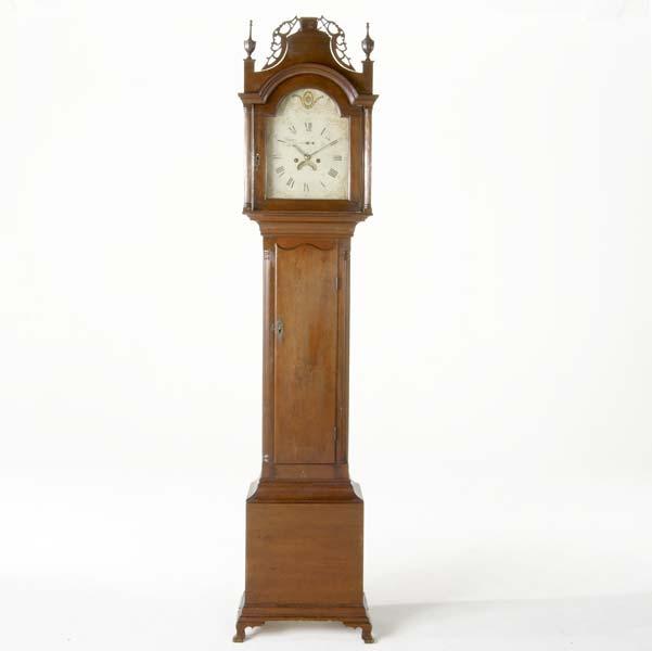 Appraisal: TALL CASE CLOCK Neoclassical walnut tall case clock with carved