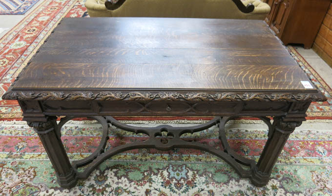 Appraisal: OAK GOTHIC REVIVAL LIBRARY TABLE American c having a rectangular