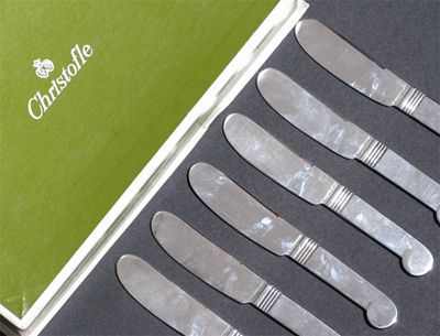 Appraisal: A set of six Christofle silver butter knives in original