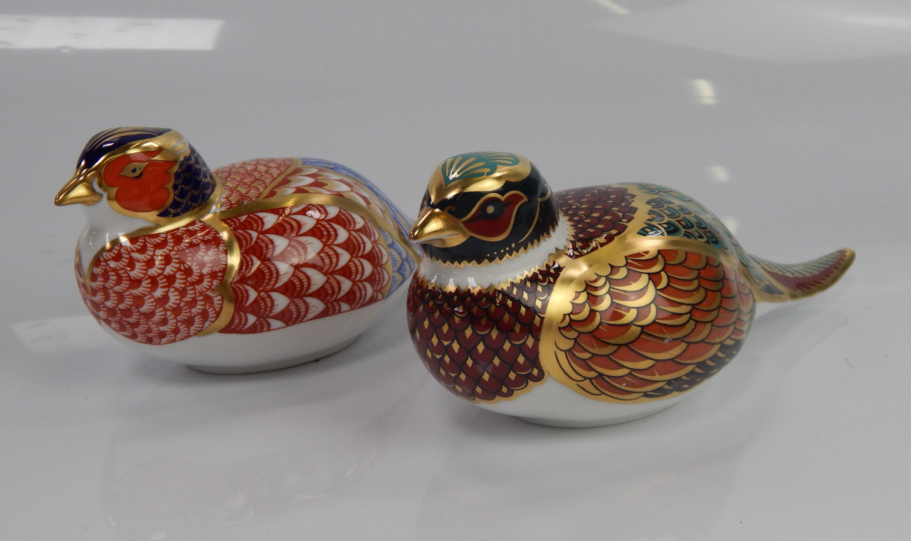 Appraisal: Two Royal Crown Derby pheasant paperweights