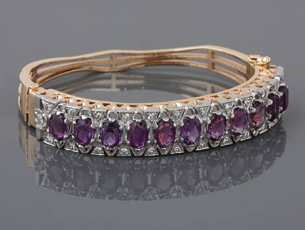 Appraisal: An amethyst diamond and k bicolor gold bangle bracelet signed