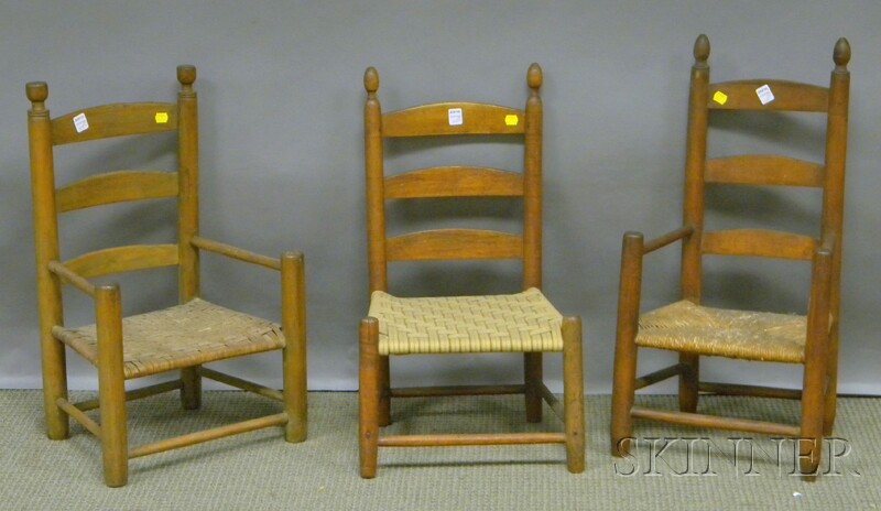 Appraisal: Three Child's Ladder-back Chairs two side chairs and an armchair