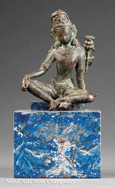 Appraisal: An Antique Southeast Asian Patinated Bronze Figure of a Bodhisattva