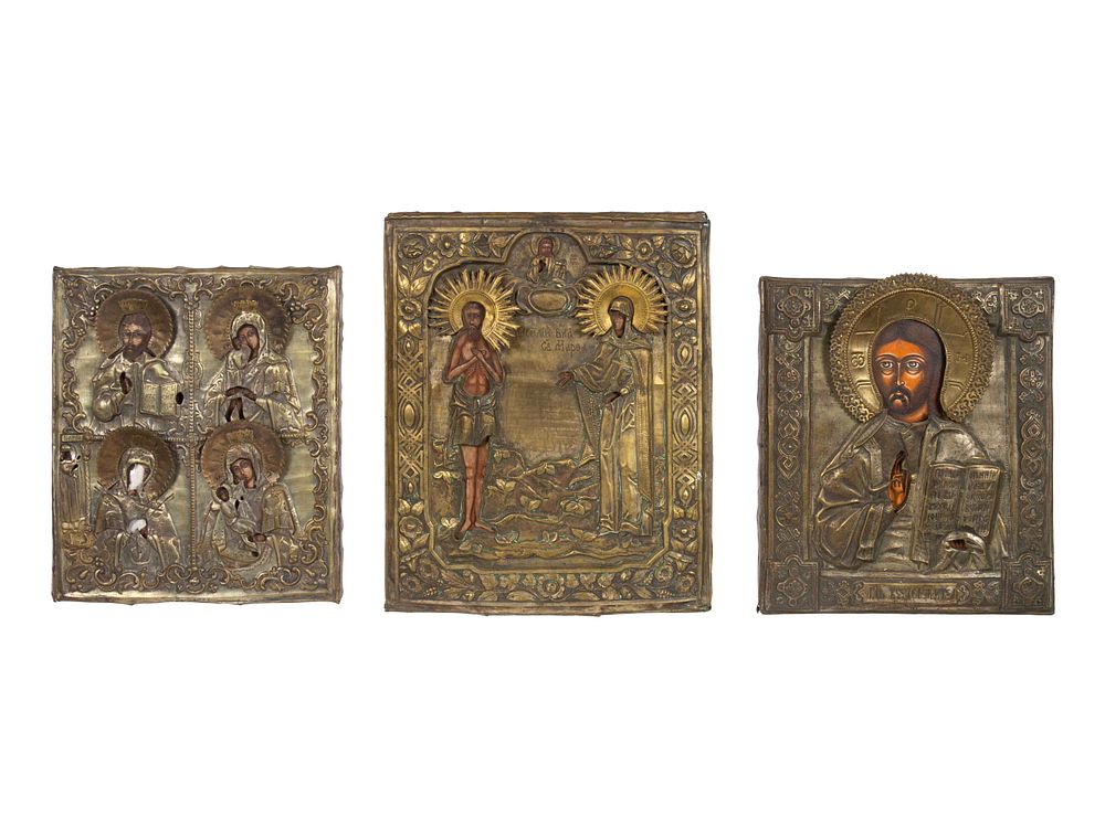 Appraisal: Three Russian Brass Oklad Mounted Icons Three Russian Brass Oklad