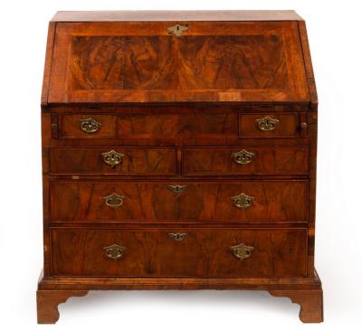 Appraisal: A George I walnut bureau cross banded and with feather