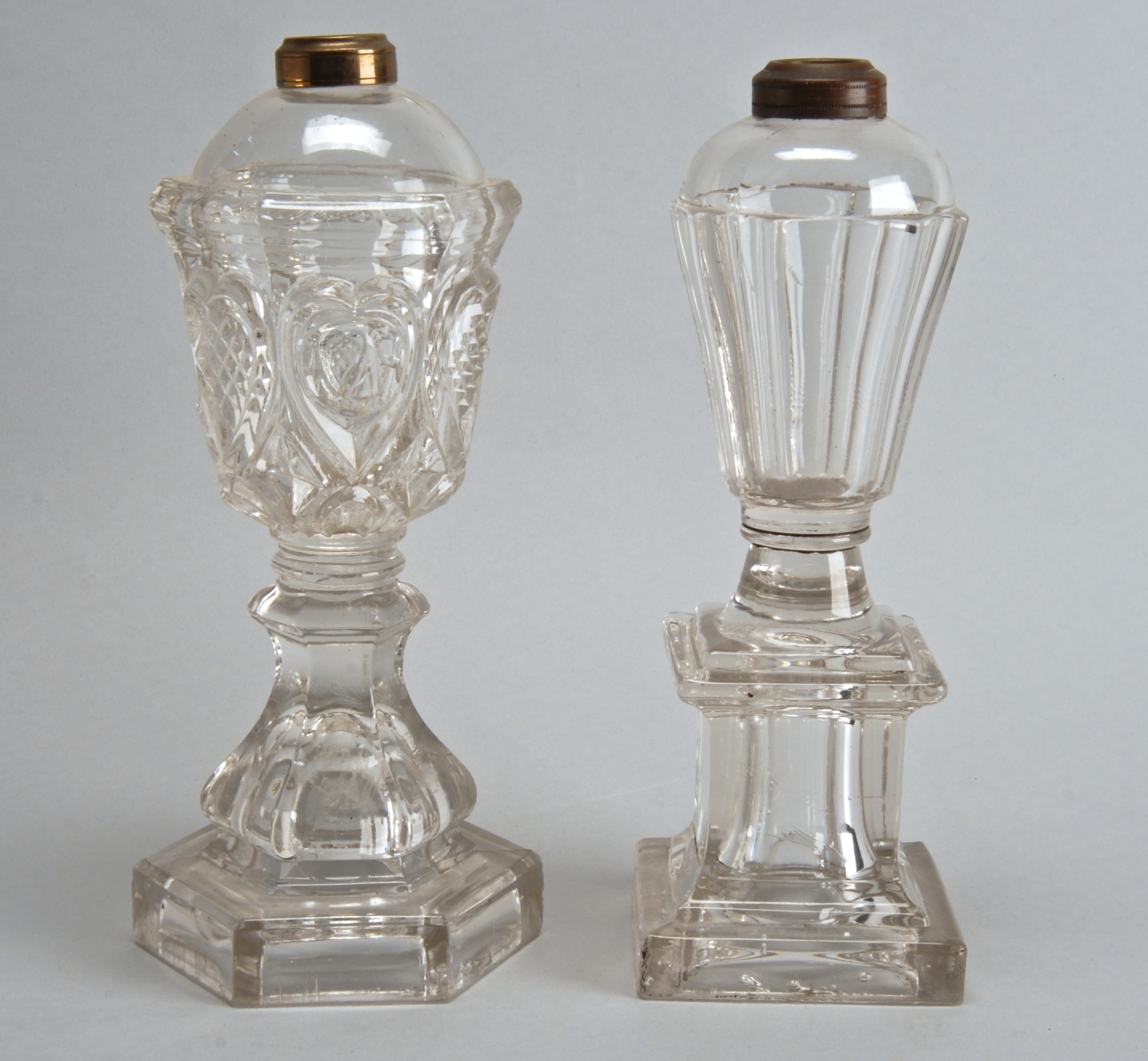 Appraisal: TWO SANDWICH GLASS WHALE OIL LAMPS one Sweetheart pattern and