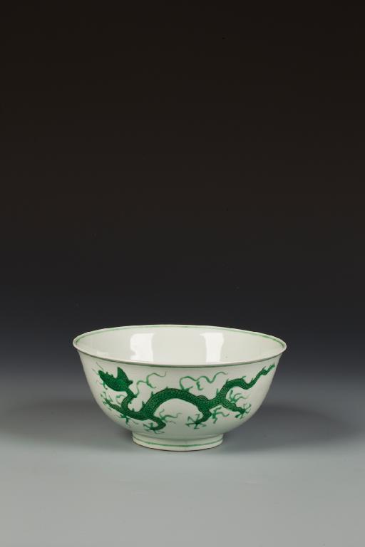 Appraisal: A CHINESE GREEN DRAGON BOWL the exterior finely incised with