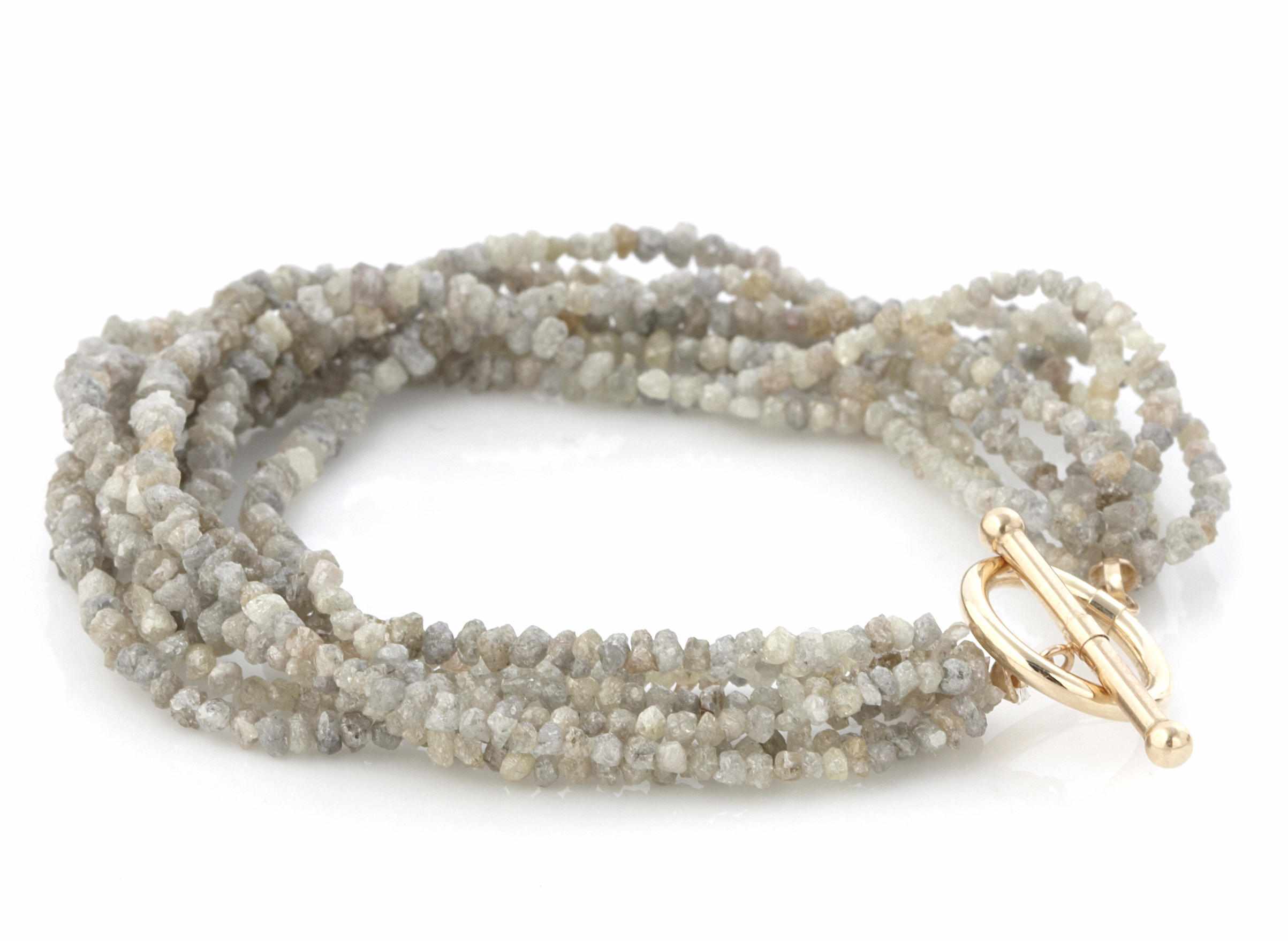 Appraisal: A multi-strand rough colored diamond and gold bracelet estimated total