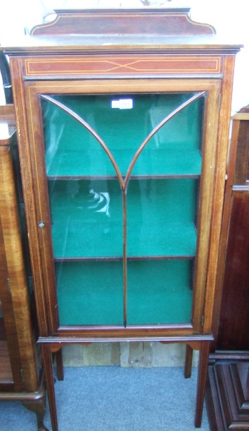 Appraisal: A th century mahogany and line inlaid display cabinet the