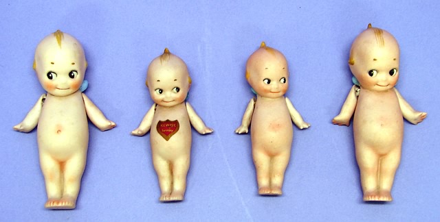 Appraisal: Kewpie Group of all bisque Kewpie dolls marked on feet