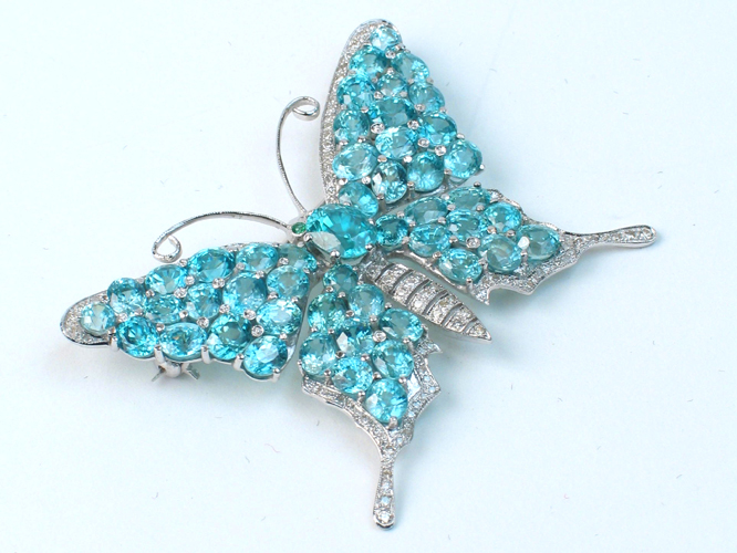 Appraisal: BLUE ZIRCON EMERALD DIAMOND AND EIGHTEEN KARAT WHITE GOLD BUTTERFLY