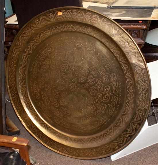 Appraisal: Large Indian etched brass charger Estimate - No condition report