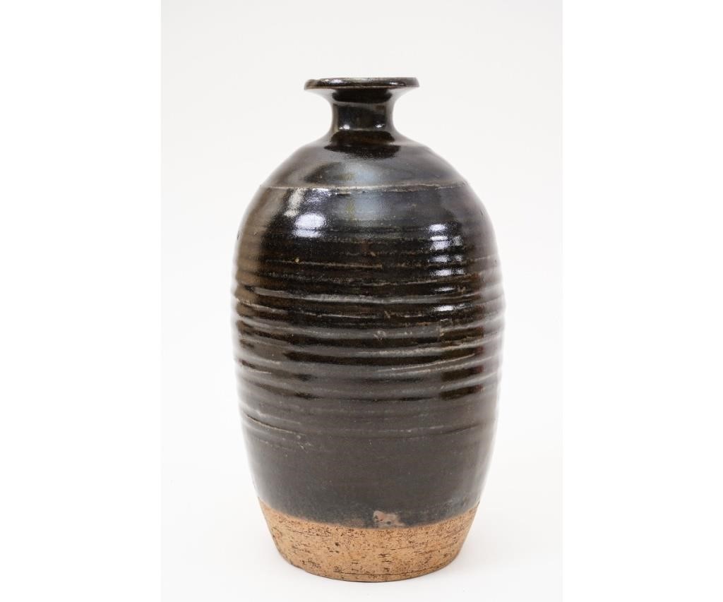 Appraisal: Chinese black glazed vase with circular ribbed decoration Sung Dynasty