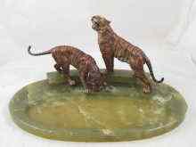 Appraisal: A fine pair of cold painted bronze tigers each measuring