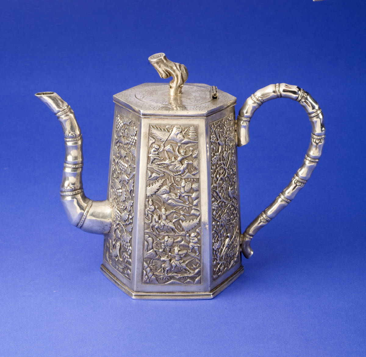 Appraisal: CHINESE EXPORT SILVER HEXAGONAL COFFEEPOT Three panels chased and repousse