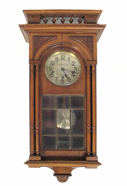 Appraisal: A walnut wall clock height in width in depth in