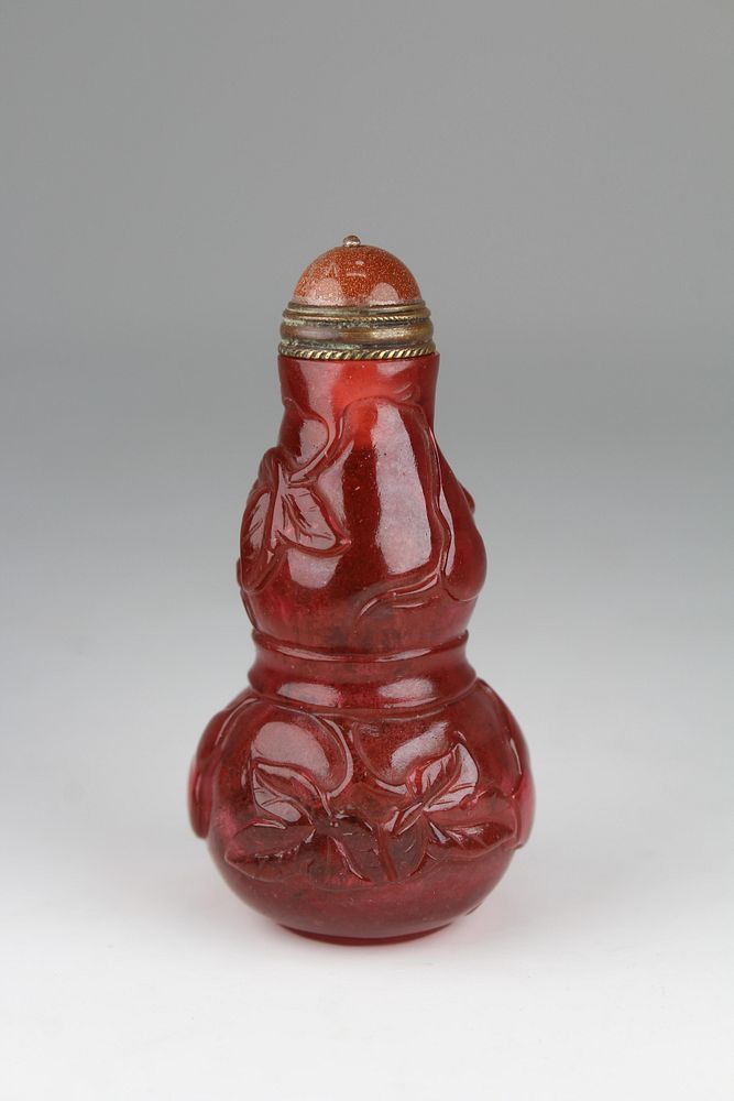 Appraisal: Chinese Qianlong Double-Gourd Glass Snuff Bottle A double-gourd glass snuff