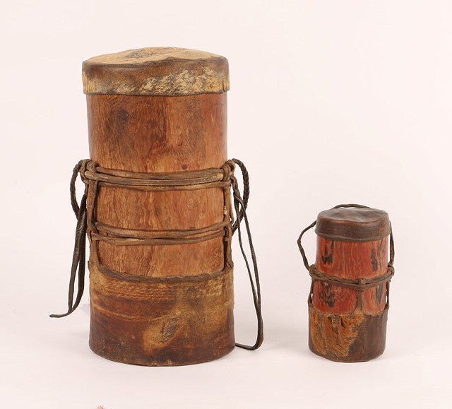 Appraisal: A TURKANA TRIBE CYLINDRICAL WOODEN MILK CONTAINER with leather handles