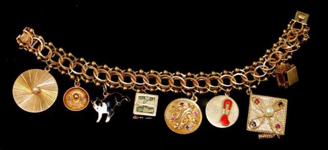 Appraisal: JEWELRY Vintage kt Gold Charm Bracelet With seven kt charms