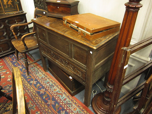 Appraisal: AN ANTIQUE OAK MULE CHEST with lifting lid panelled front