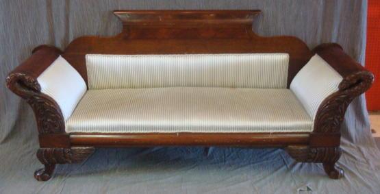 Appraisal: Empire Carved Wood Scroll Arm Sofa Raised on Ball and